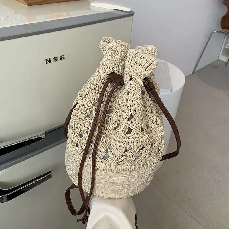 Borsa a tracolla da spiaggia in paglia estiva da donna fatta a mano borsa a tracolla con coulisse cava intrecciata borsa da viaggio con Design femminile di moda lavorata a maglia