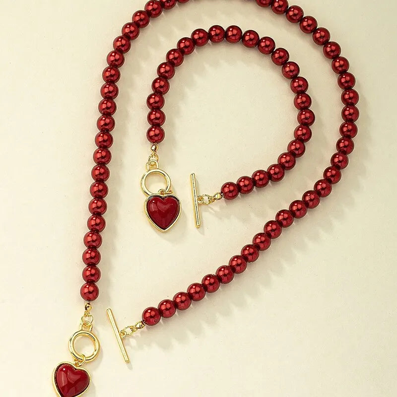 Set di gioielli con bracciale e collana di perle imitazione da 2 pezzi. Elegante collare con perline di colore naturale con ciondolo color perla per ragazza