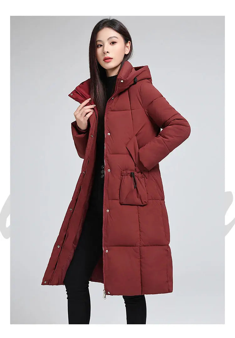Caldo piumino in cotone da donna Inverno 2025 Nuova versione coreana Cappotto lungo con cappuccio allentato Cappotto Parka spesso antivento femminile