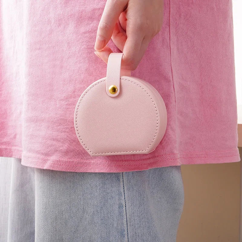 Mini organizzatore di gioielli Display Portagioie da viaggio Scatole Orecchini Collana Anello Borsa portatile Portagioie Portaoggetti in pelle