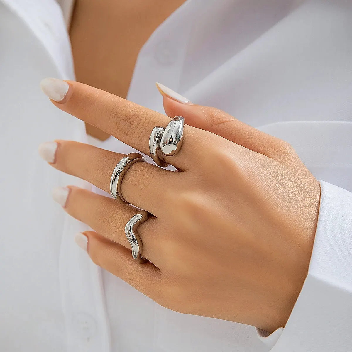 Set di anelli a forma di onda geometrica creativa alla moda da 3 pezzi per accessori per gioielli da dito con anello aperto regolabile irregolare di design da donna