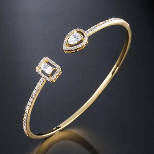 Braccialetti con polsino color oro con geometria di lusso per le donne Braccialetti con zirconi cubici alla moda INS Gioielli per feste quotidiane.