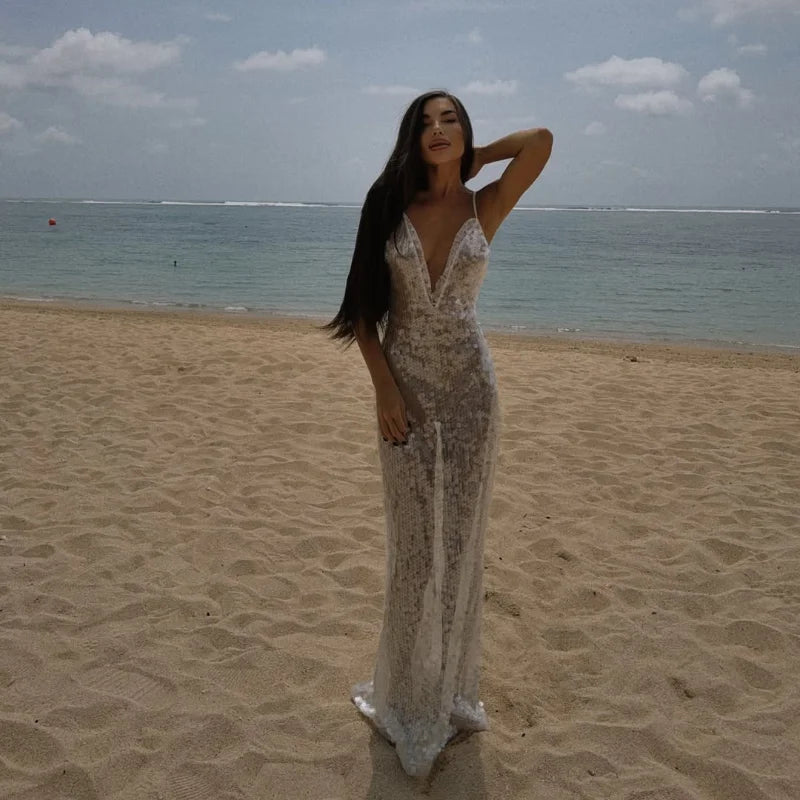 Abito trasparente con cinturino per spaghetti con paillettes Abito da donna sexy con scollo a V in pizzo profondo aderente Abiti da festa da spiaggia 2025 Abito da vacanza elegante e chic