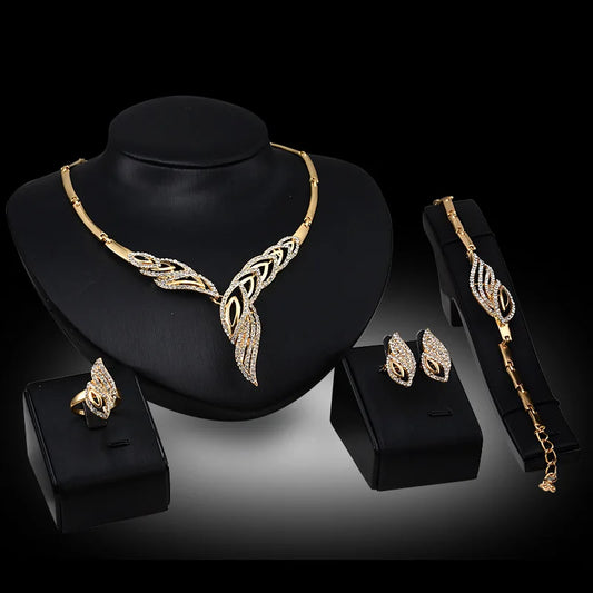Parures de bijoux pour femmes en métal avec boucles d'oreilles, colliers, bracelets et bagues au design à la mode, adaptés aux banquets et aux cadeaux de fin d'année.