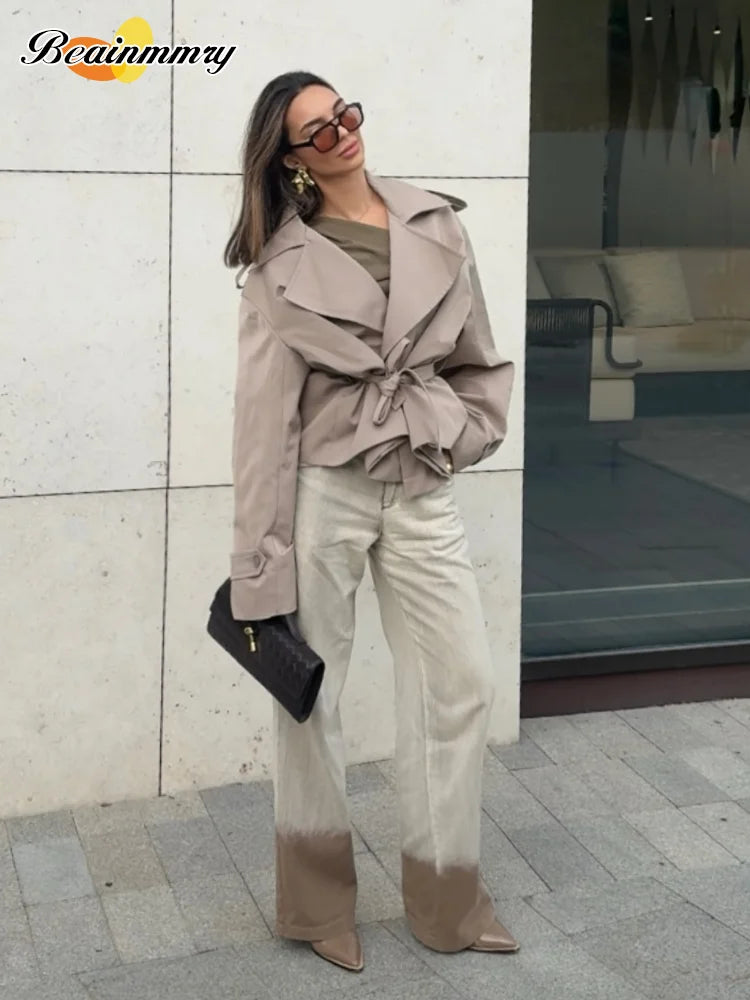 Trench con lacci con risvolto solido per le donne Moda maniche lunghe spalla larga cappotto corto allentato 2025 Nuovo autunno pendolari Outwear