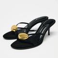 Sommer 2025 Schwarze dekorative High-Heel-Sandalen aus Metall Damenmode Runde offene Spitze Sexy dünne High-Heel-Hausschuhe Damenschuhe