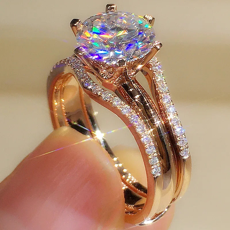 Huitan Anelli unici color oro rosa per le donne Classici 6 artigli progettati Anelli con zirconi cubici Fasce di fidanzamento per matrimoni Gioielli caldi