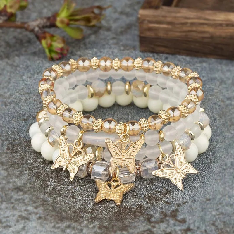 Set di braccialetti con perline a farfalla alla moda da 4 pezzi per le donne, perline acriliche rosa, braccialetto a catena elastica, regalo di gioielli per feste bohémien femminili