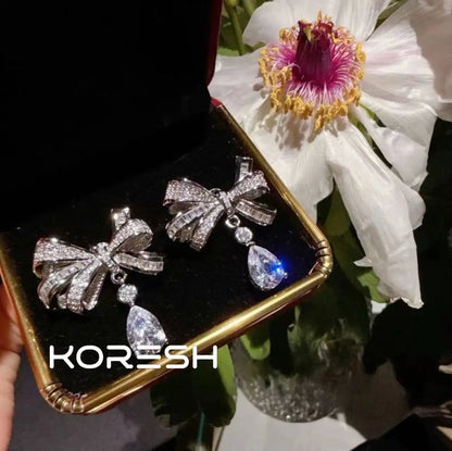 Collier pour femmes avec nœud et diamants, nouvelle parure de boucles d'oreilles pendantes en zircon pour femmes 2025