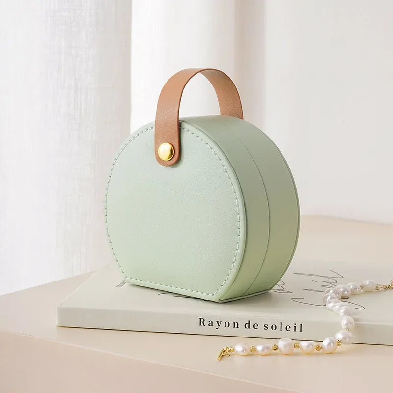 Mini organizzatore di gioielli Display Portagioie da viaggio Scatole Orecchini Collana Anello Borsa portatile Portagioie Portaoggetti in pelle