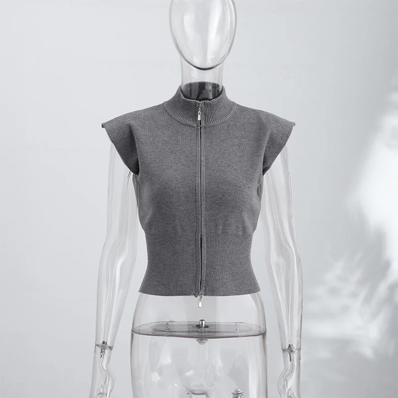 Cardigan in maglia da donna senza maniche con spalline imbottite, collo alto a metà, doppia cerniera, corto, aderente, tinta unita, top di tendenza per la strada
